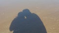Shadow of a couple on the beach Royalty Free Stock Photo