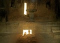 Shadow of a couple reflecting on the floor of an old stone church