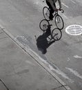 Shadow of cyclist