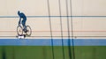 Shadow of a cyclist training at a velodrome. preparation for professional competitions. Original shape top view Royalty Free Stock Photo