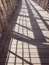 Shadow of The Evan Walker footbridge handrailing
