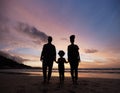 Shadow, family at beach and holding hands at sunset, bonding or outdoor on mockup space. Silhouette, sea and father, kid Royalty Free Stock Photo