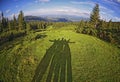 Shadow of friends among fantastically beautiful scenery on the background of the Carpathian mountains