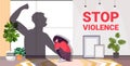 Shadow of furious angry man raised punishment fist over scared woman stop family violence and aggression concept