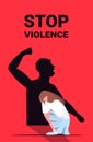 Shadow of furious angry man raised punishment fist over scared woman stop family violence and aggression concept