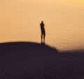 Shadow of a man in the desert Royalty Free Stock Photo