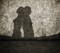 Shadow of the man and the woman on wall Royalty Free Stock Photo