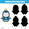 Shadow matching game. Kids activity with cute winter penguin Royalty Free Stock Photo