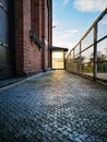 Shadow of metal railing on transparent plastic looks like glass at the end of ramp