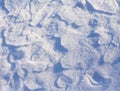 Shadow patterns and textures on crisp snow Royalty Free Stock Photo
