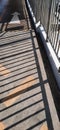 Shadow on the pedastrian overpass Royalty Free Stock Photo