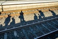 shadow of people waiting for the train