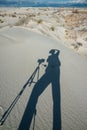 Shadow of a photographer on a gypsum dune in White Sands National Monument in New Mexico, USA Royalty Free Stock Photo