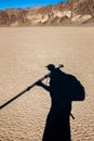 Photographer shadow in the desert Royalty Free Stock Photo