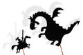 Shadow puppets of dragon and knight Royalty Free Stock Photo