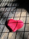 Red heart under grid pattern shadow Royalty Free Stock Photo