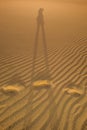 Shadow on the sand dunes Royalty Free Stock Photo