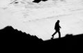 Shadow silhouette of a man walking alone down city stairs Royalty Free Stock Photo