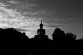 Shadow of standing buddha and thai temple with sky