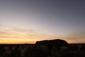 Shadow of Uluru Ayers Rock at sunset. Picture approved by Uluru Media office