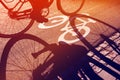 Shadow of unrecognizable cyclist on bicycle lane Royalty Free Stock Photo