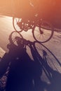 Shadow of unrecognizable cyclist on the road Royalty Free Stock Photo