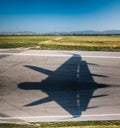 Shadow wing airport tarmac arrival departure military futuristic