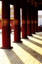 The shadow of the wooden pole is red Royalty Free Stock Photo