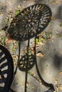 Shadow of a wrought iron table