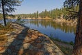 Shadows on Bismark Lake shorline rock Royalty Free Stock Photo