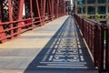 Shadows of the bridge railing design on Wells Street drawbridge in downtown Chicago Loop Royalty Free Stock Photo