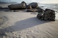 Rocks on the beach at sunset