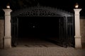 Shadows cast by a wrought iron gate in the moonlight Royalty Free Stock Photo