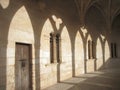Shadows in the castle cloister Royalty Free Stock Photo