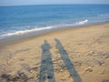 Shadows of Couple on a Sandy Beach