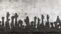 Shadows of the Hands, Arms and Fists of Protestors Against a Grungy Blank Brick Wall Ready for Your Text