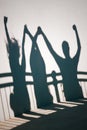 Shadows of happy people Royalty Free Stock Photo