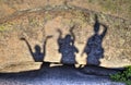 Shadows of happy people Royalty Free Stock Photo