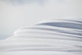 Shadows and light on mountain snowdrift cornice Royalty Free Stock Photo