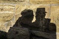 Shadows of a pair of lovers on the big rocks of a medieval castle