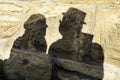 Shadows of a pair of lovers on the big rocks of a medieval castle