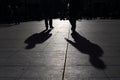 Shadows of people walking in a street of the city, Athens Royalty Free Stock Photo