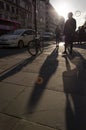 Shadows of people walking in the street Royalty Free Stock Photo