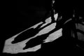Shadows on the wall from walking people. Abstraction Royalty Free Stock Photo