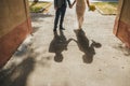 Shadows of wedding couple in sunny day background Royalty Free Stock Photo