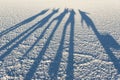 Shadows in the world`s largest salt flat, Salar de Uyuni in Bolivia, photographed at sunrise