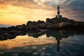 shadowy lighthouse on rocky coastline at dusk Royalty Free Stock Photo