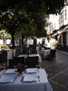 Shady Cafe in the old Quarter of Seville Spain