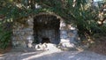 In a shady corner of the park there is an old stone grotto.