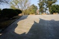 Shady roadside ramp in sunny winter afternoon